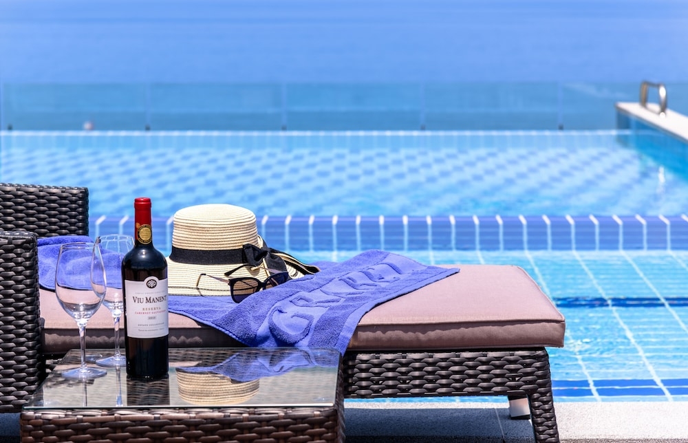 チェックイン / チェックアウト キオスク