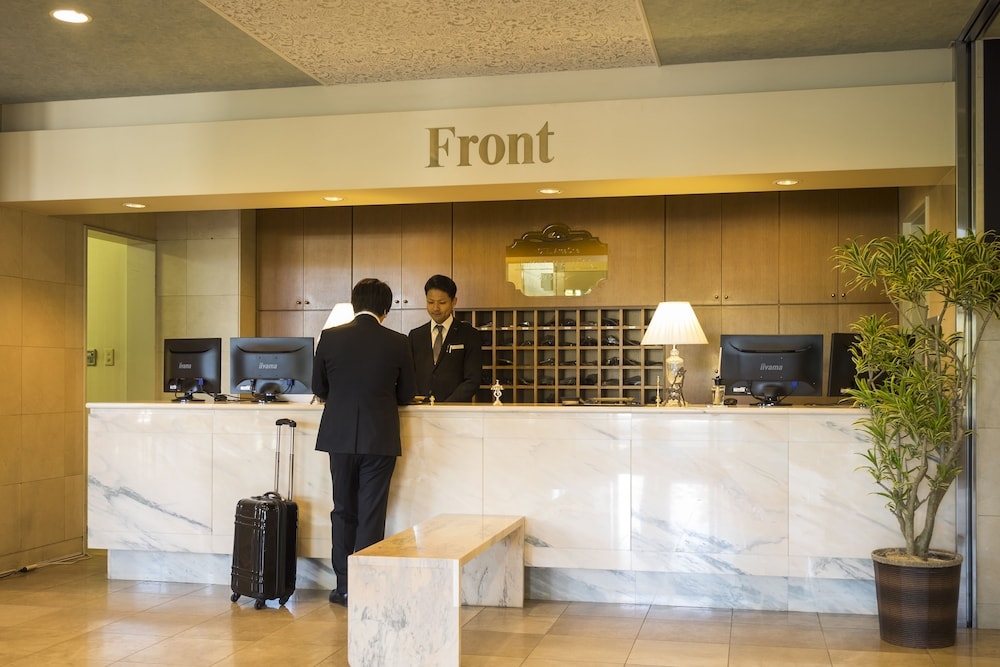 チェックイン / チェックアウト キオスク