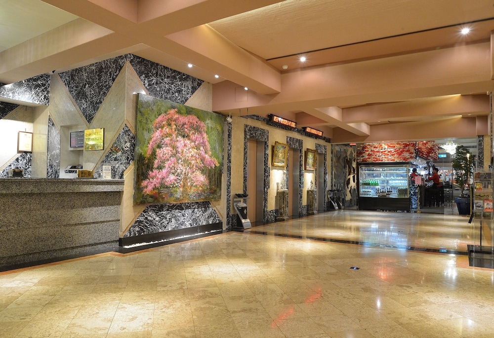 チェックイン / チェックアウト キオスク