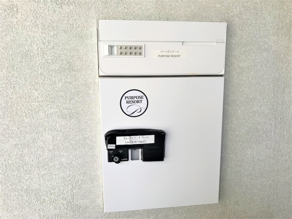 チェックイン / チェックアウト キオスク